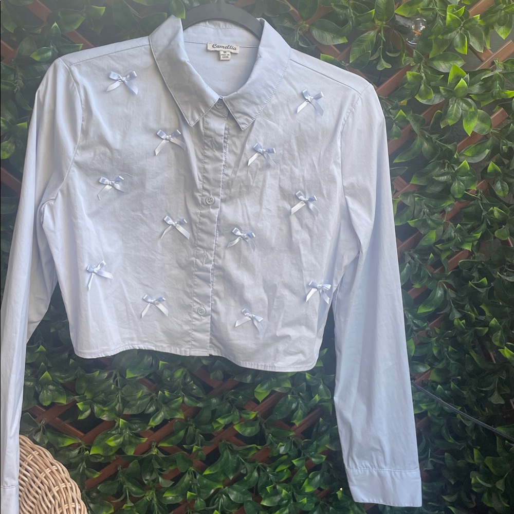 Blue Cropped Shirt with Bow Accents